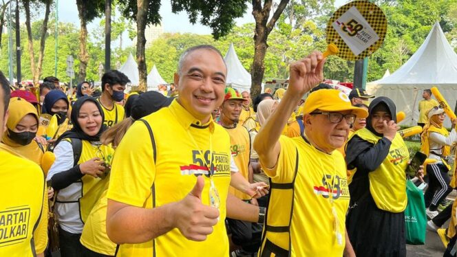 
Zaki Iskandar iskandar saat jalan santai HUT Golkar ke 58